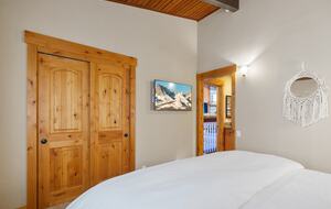 Upstairs Primary Bedroom (King) with ensuite bathroom.