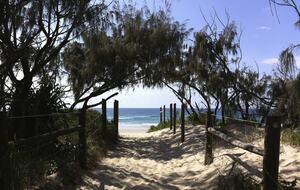 Beach entrance in front of the house