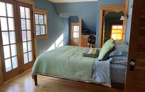 Primary Bedroom with half bath