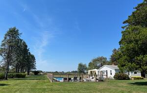 View of the yard from main house back deck