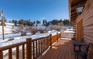 Master Bedroom long deck length of room with winter views