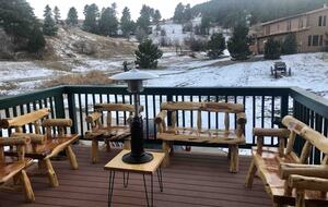 View off of Barn Deck looking up to log cabin