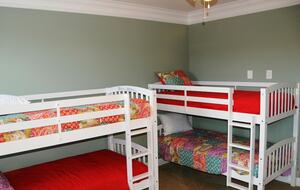 Second Floor Bedroom with Two Bunk Beds, Dresser, TV and Full Bath