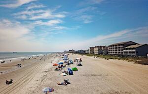 Drone photo of the beach facing south towards the Surfside Beach pier
