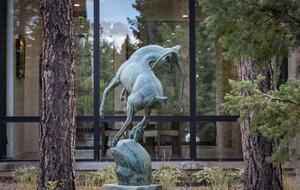 Gazelle sculpture outside dining room windows.