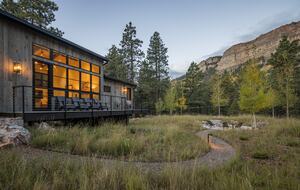 Living room & Guest room wing overlooking firepit.