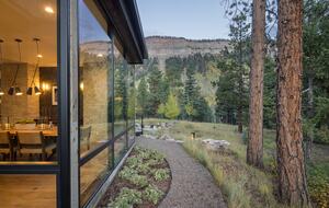 Interior dining room contrasted with Hermosa Cliffs.