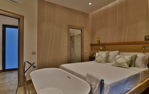 Master bedroom in dependence with whirlpool tub