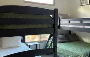 Bedroom with 2 bunk beds (3 twin and 1 double)