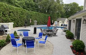 Backyard with pool, hot tub and ample seating