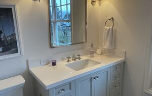 The spa like feel of the first guest bathroom.