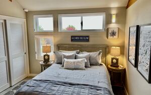 Downstairs lighter queen bedding used during warmer months.