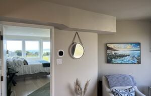 Looking into primary bedroom from landing area “the Bridge”