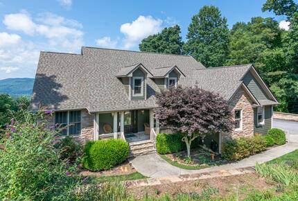 The house sits below street level which and is oriented to the back