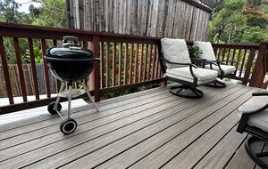 Private porch with BBQ and a view of the Pūpūkea Forest Reserve