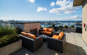 Shared roof top deck firepace