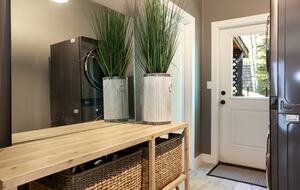 Laundry room that opens to the garage and a dog run