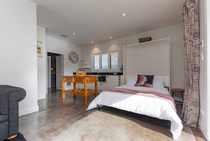 A queen sized murphy bed if your guests total 3 or 4