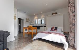 A queen sized murphy bed if your guests total 3 or 4