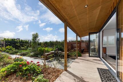 French doors open up to give a seamless view of the garden