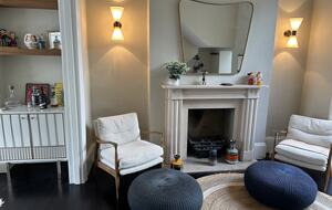 SITTING AREA WITH GAS FIRE PLACE AND GIN CUPBOARD