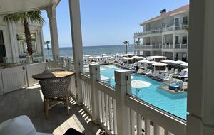 Veranda showing view of ocean and pool