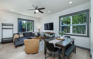 Comfortable family room area and kitchen table for six