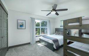 Third bedroom with queen bed and bunkbeds
