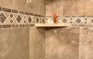 Ensuite bathroom with soap and shampoo provided.