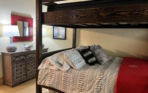Bunkroom bed and dresser.