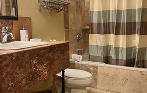Hall bathroom with tub for the little ones.