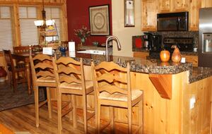 Kitchen counter seats three.