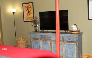 Smart TV in master bedroom.