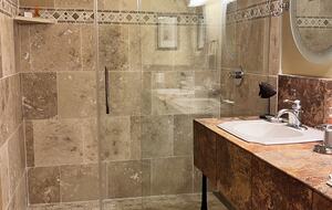 New walk-in shower in master bedroom ensuite bathroom.
