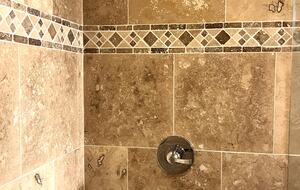 New walk-in shower and fixtures.