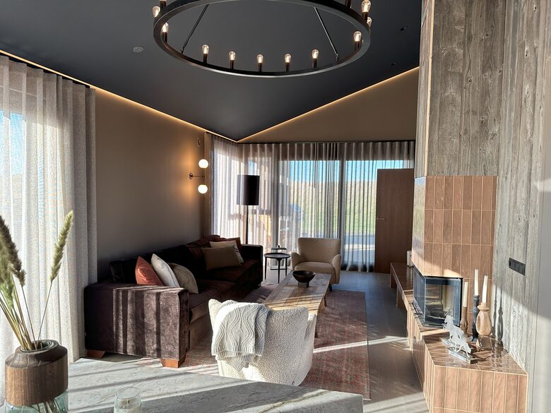 View Sofa area in main house and fire place
