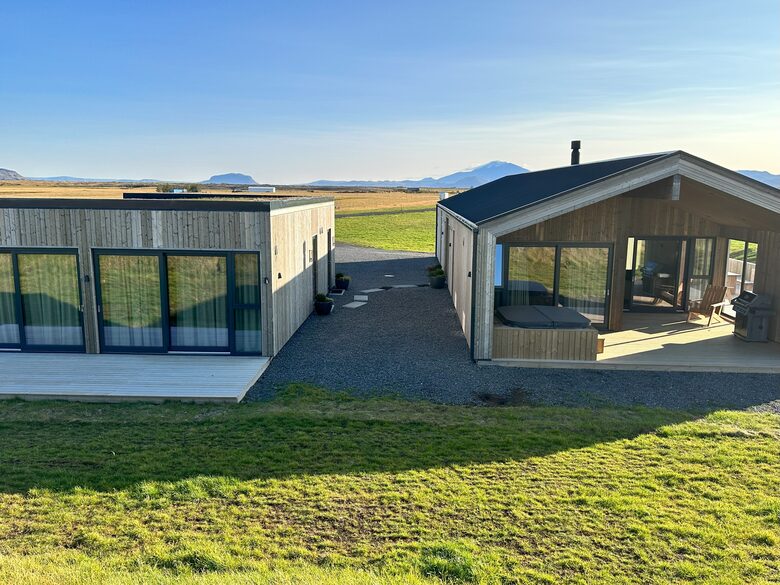 View over the main house and guest house seen from between
