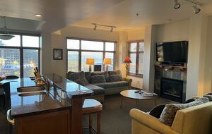 Extra large living room with fireplace and spectacular views