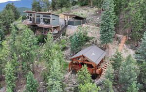Aerial view of the Zen Treehouse, car port,& Glamping Tent