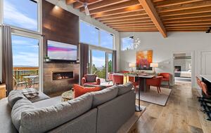 Living & dining room, primary deck left, kitchen right