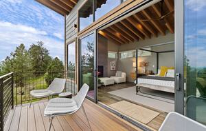 Primary bedroom view from private deck