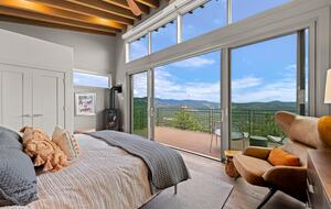 View from guest suite with fireplace and private deck