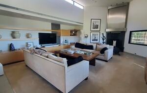 Family Room with TV, Fire Place and Fountain