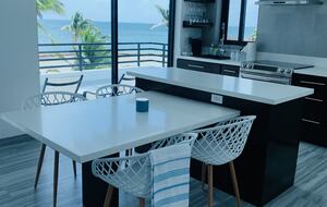 kitchen with island and dining attached