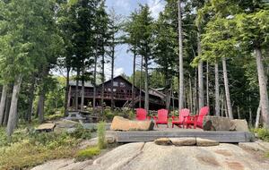 Terraced deck off point with sitting , picnic table, fire pit on point