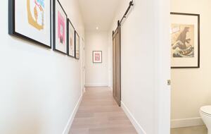 Hallway to bedrooms and laundry room