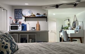 Summer bedding in guest suite.