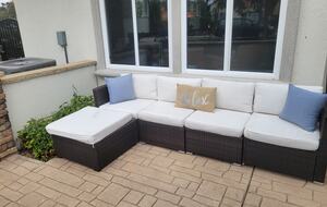 Lanai with patio furniture and umbrella