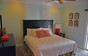 First Floor Master Bedroom with TV, Full Bath, Dresser and Private Dec