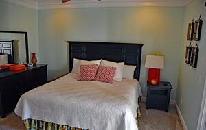 First Floor Master Bedroom with TV, Full Bath, Dresser and Private Dec